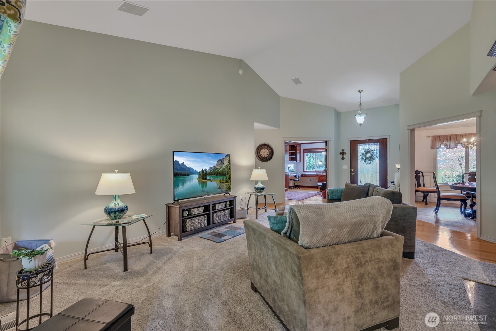 103 Southeast Alder Manor Road Shelton, WA 98584 - Photo 3 of 39 a living room with furniture and a flat screen tv