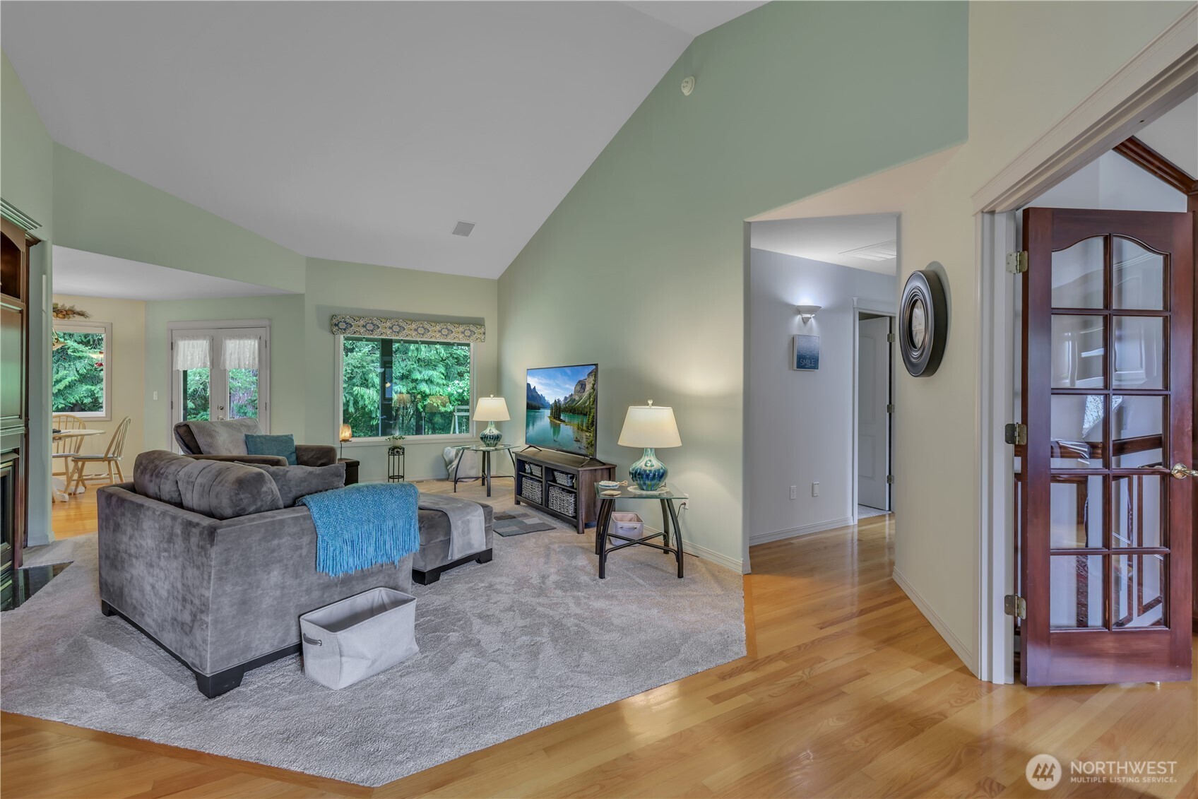 103 Southeast Alder Manor Road Shelton, WA 98584 - Photo 5 of 39 a living room with furniture and a wooden floor