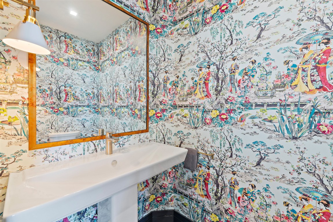 501 West Avenue, Unit 2202 Austin, TX 78701 - Photo 22 of 33 a bathroom with a sink and a mirror