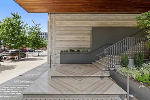 a view of a patio with couches and potted plants