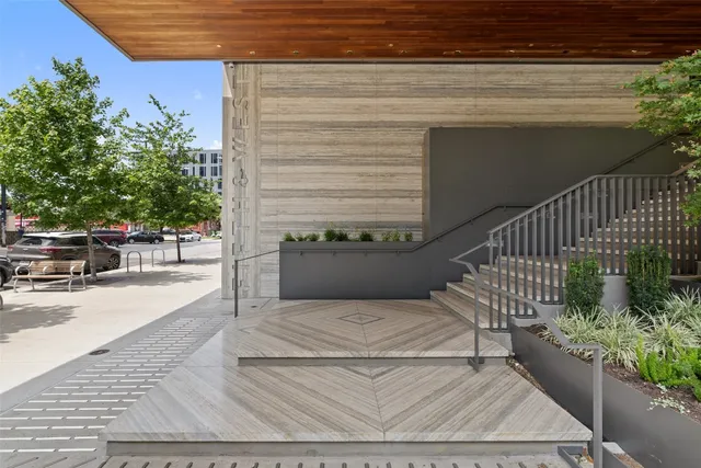 a view of a patio with couches and potted plants