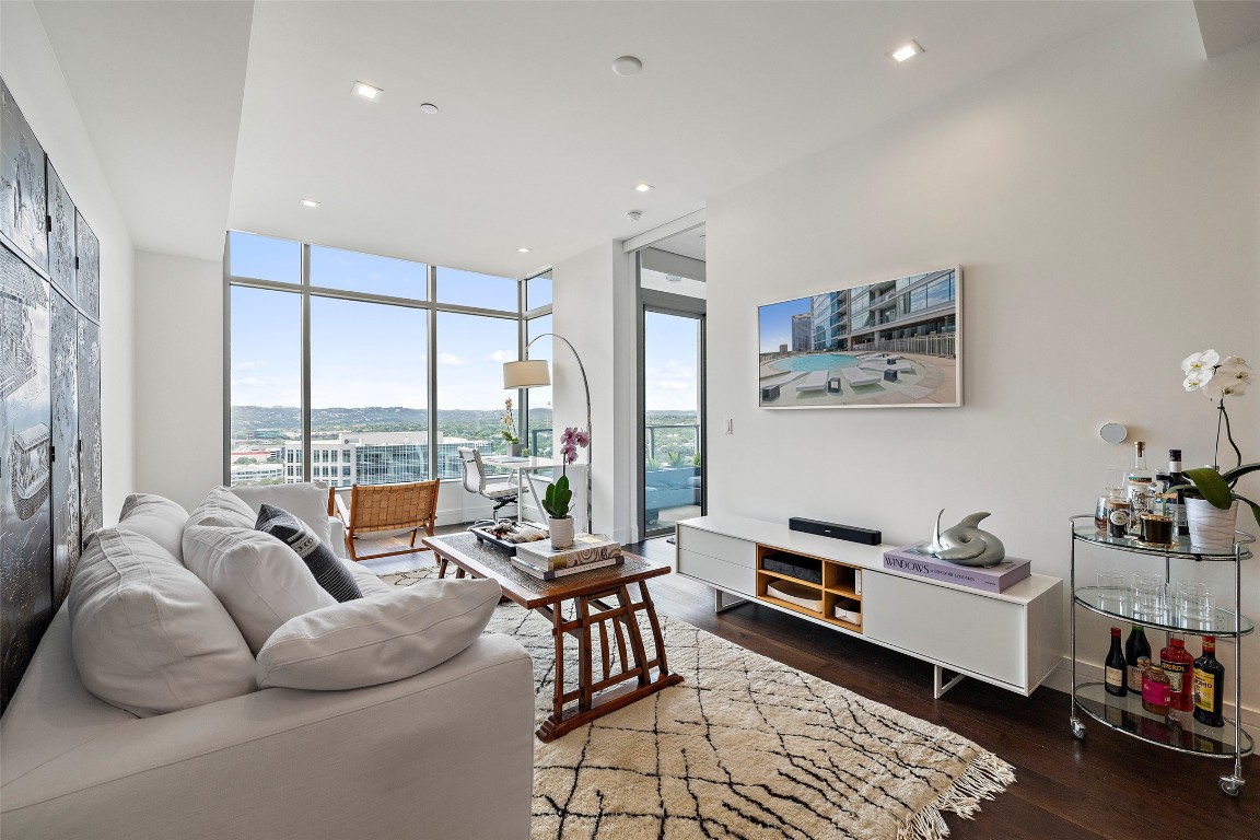 501 West Avenue, Unit 2202 Austin, TX 78701 - Photo 5 of 33 a living room with furniture and a large window