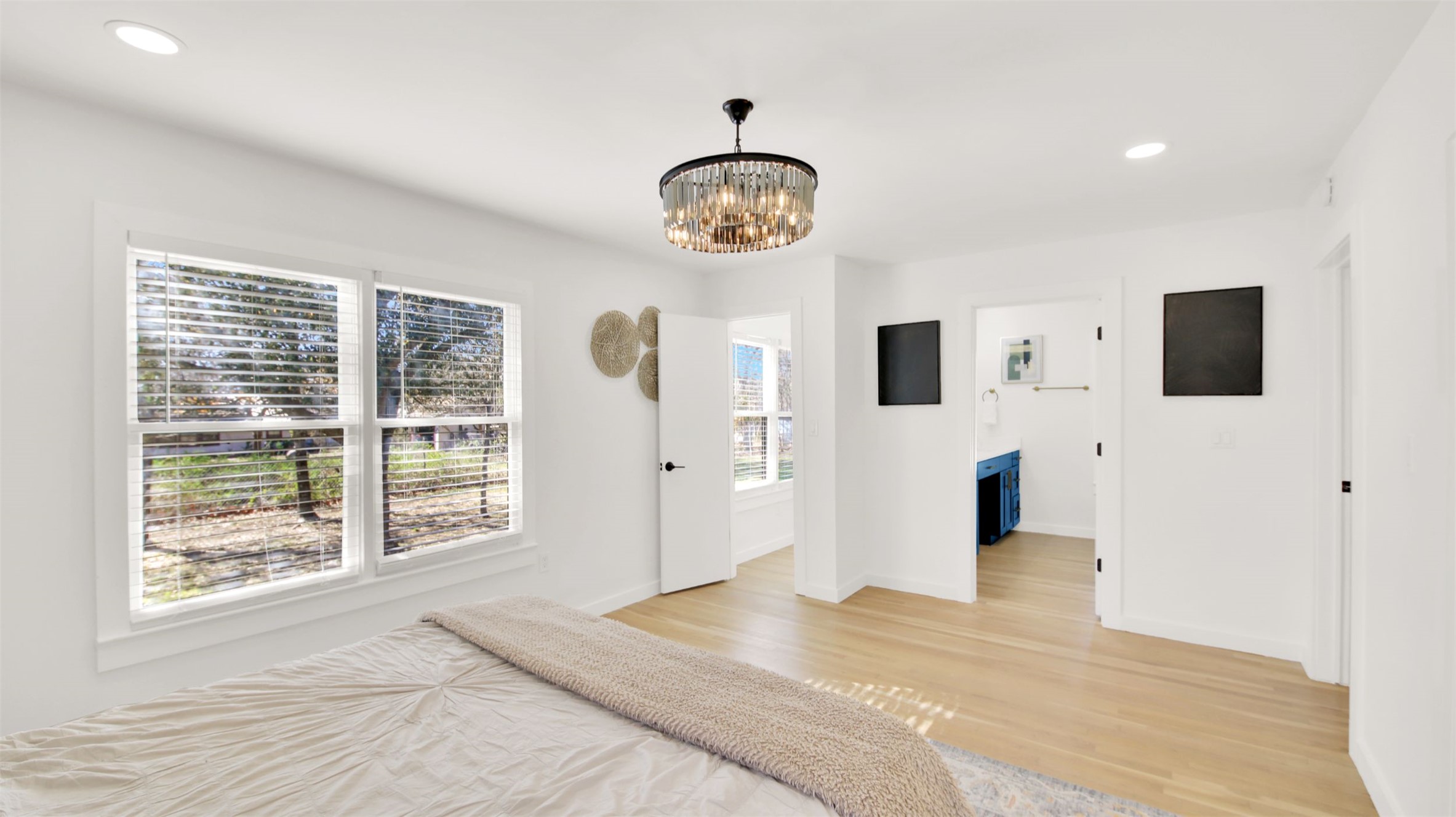 8904 Chisholm Lane Austin, TX 78748 - Photo 10 of 36 Unfurnished bedroom with recessed lighting, a chandelier, and light wood-style flooring
