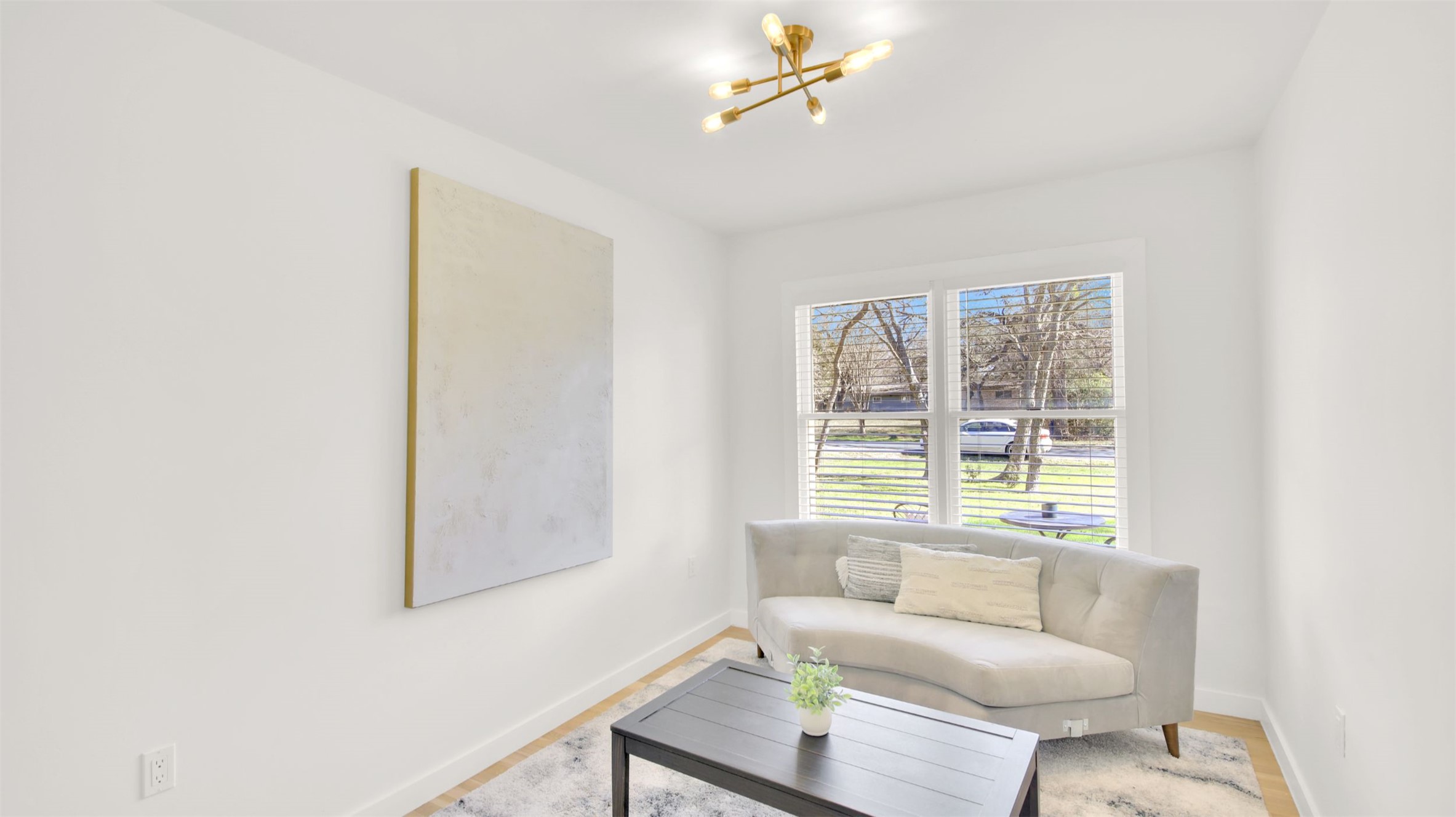 8904 Chisholm Lane Austin, TX 78748 - Photo 11 of 40 Living area with a chandelier and baseboards
