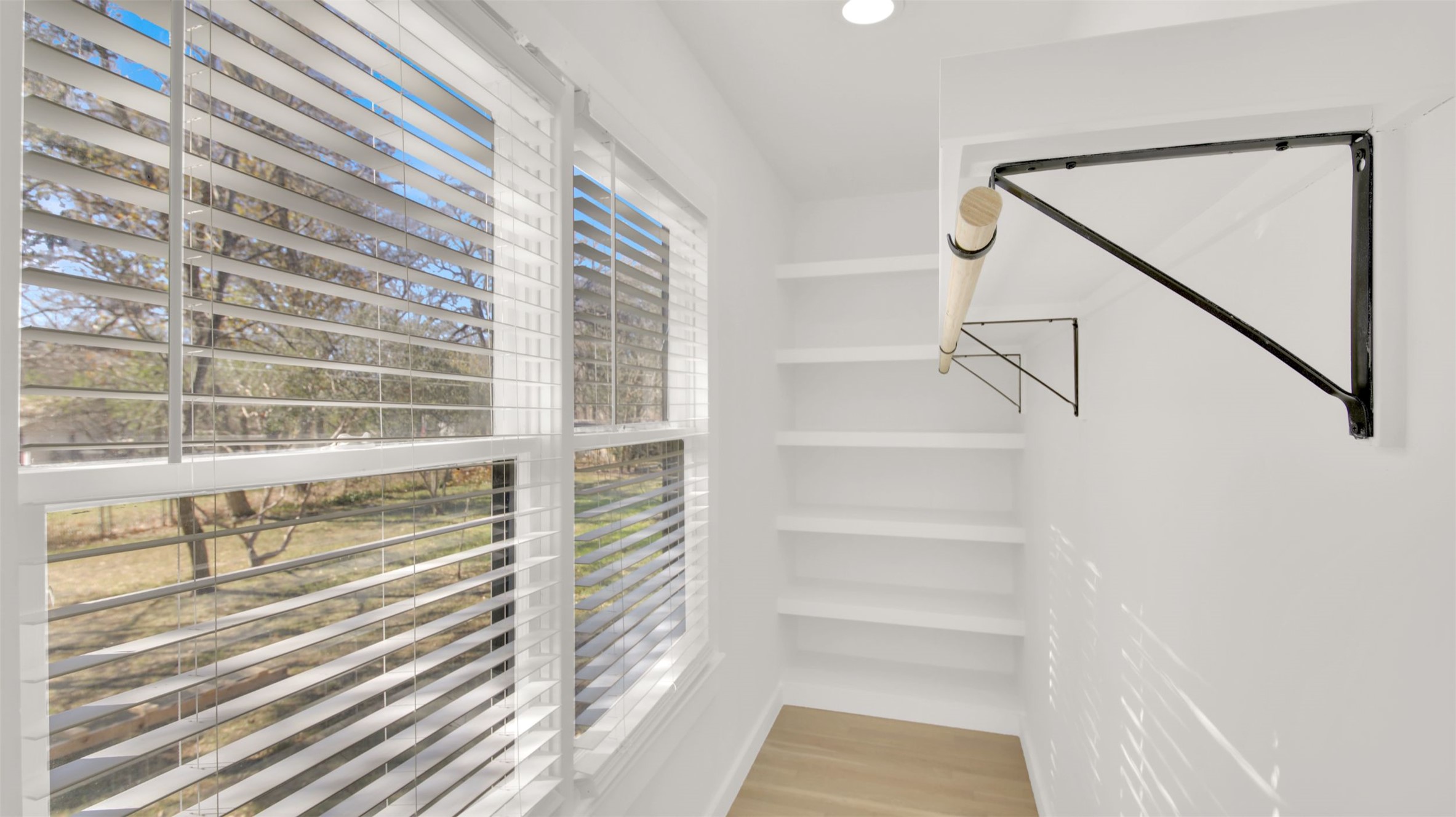 8904 Chisholm Lane Austin, TX 78748 - Photo 11 of 36 Spacious closet featuring light wood-style floors