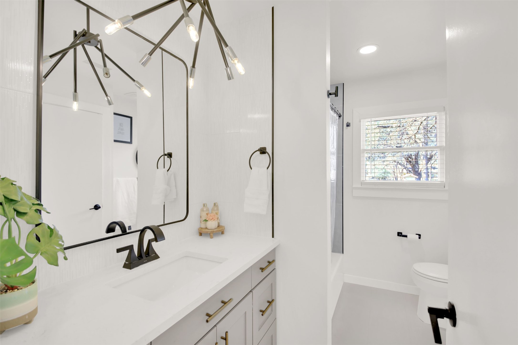 8904 Chisholm Lane Austin, TX 78748 - Photo 12 of 40 Full bathroom with vanity, shower / tub combo with curtain, and recessed lighting