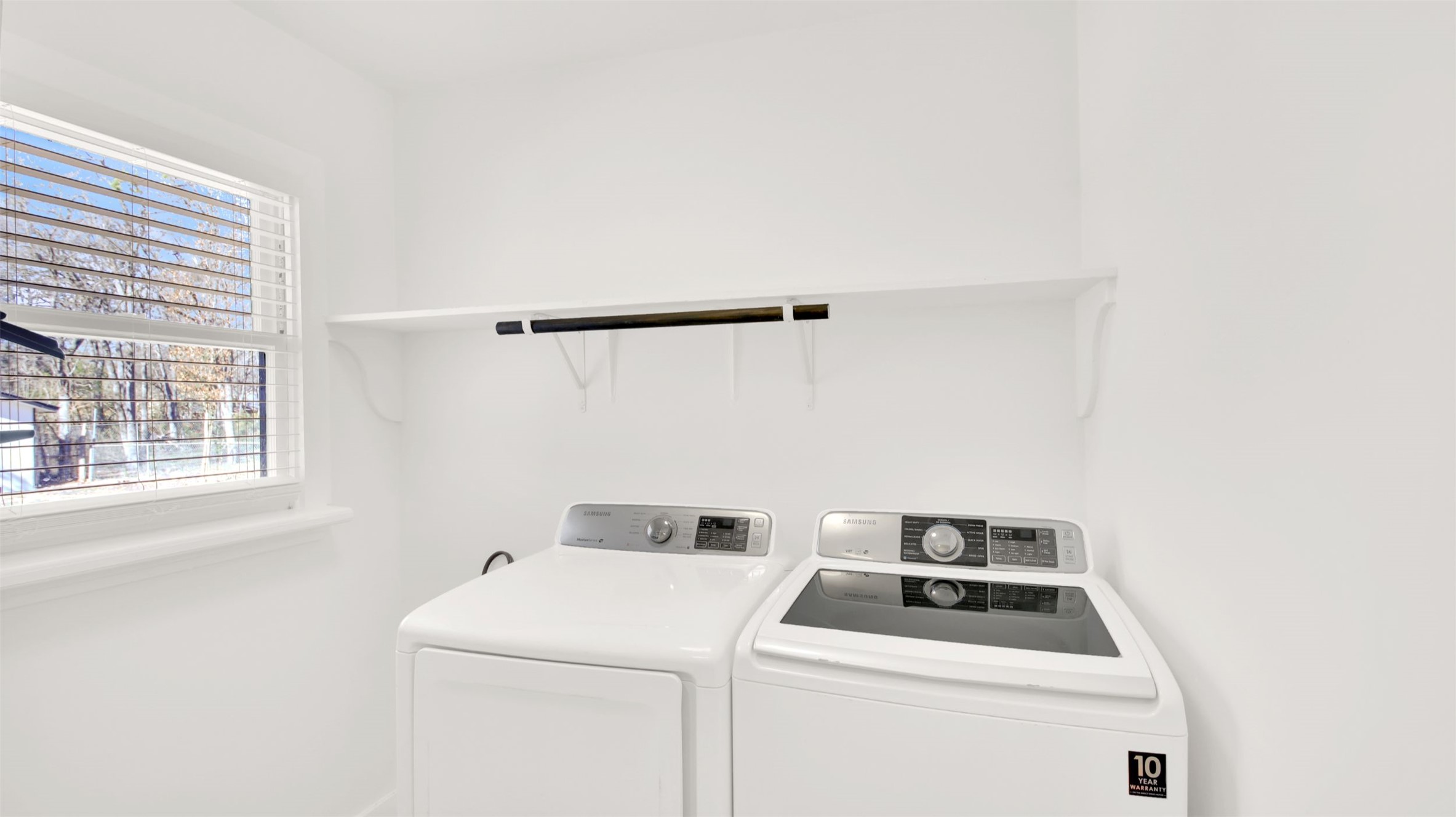 8904 Chisholm Lane Austin, TX 78748 - Photo 17 of 40 Laundry area featuring washing machine and dryer