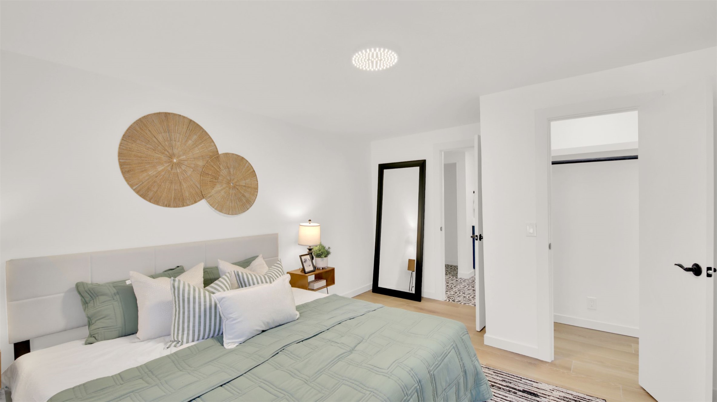 8904 Chisholm Lane Austin, TX 78748 - Photo 21 of 36 Bedroom with light wood-style flooring and baseboards