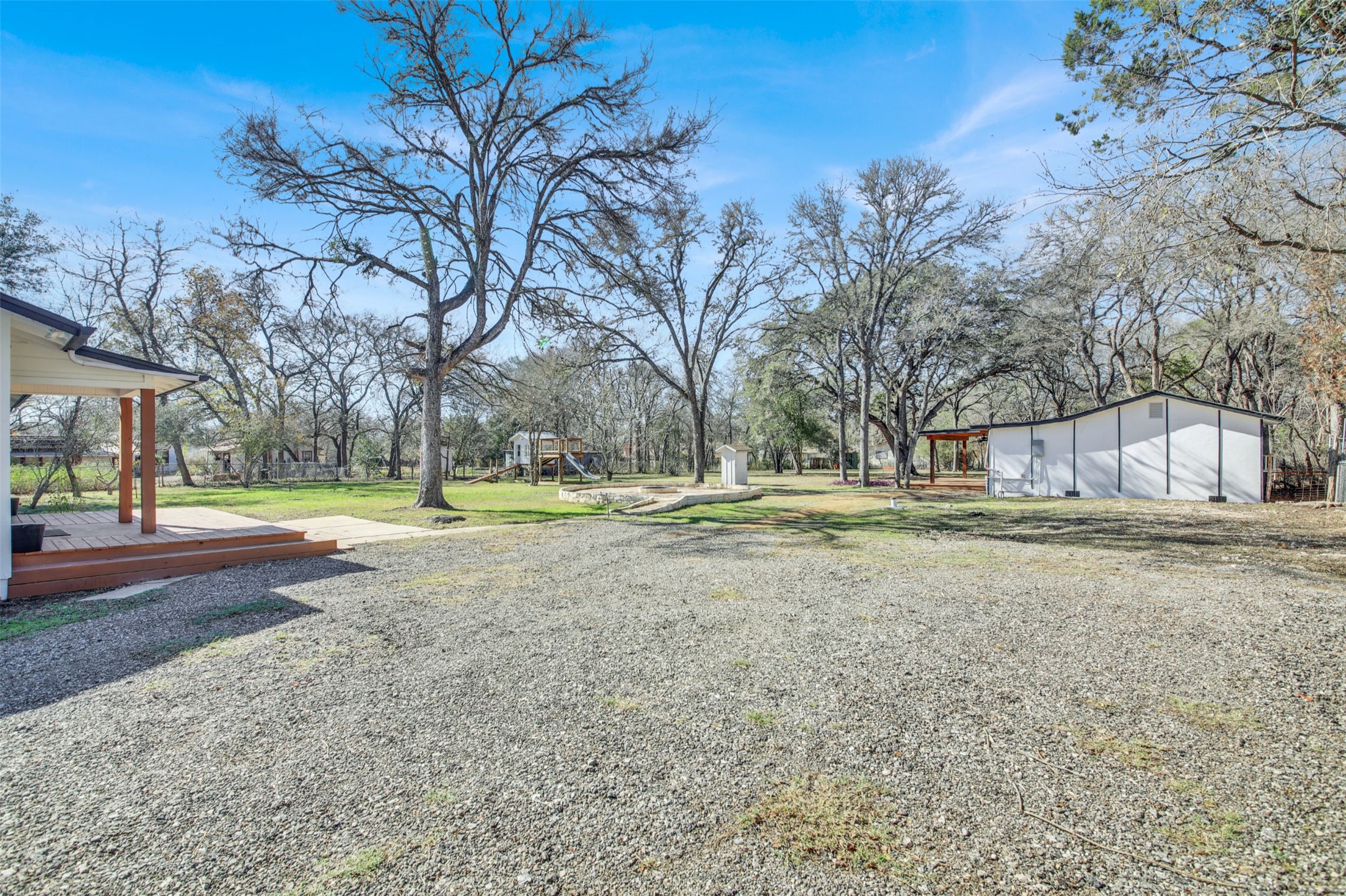 8904 Chisholm Lane Austin, TX 78748 - Photo 31 of 40 View of green lawn with a deck