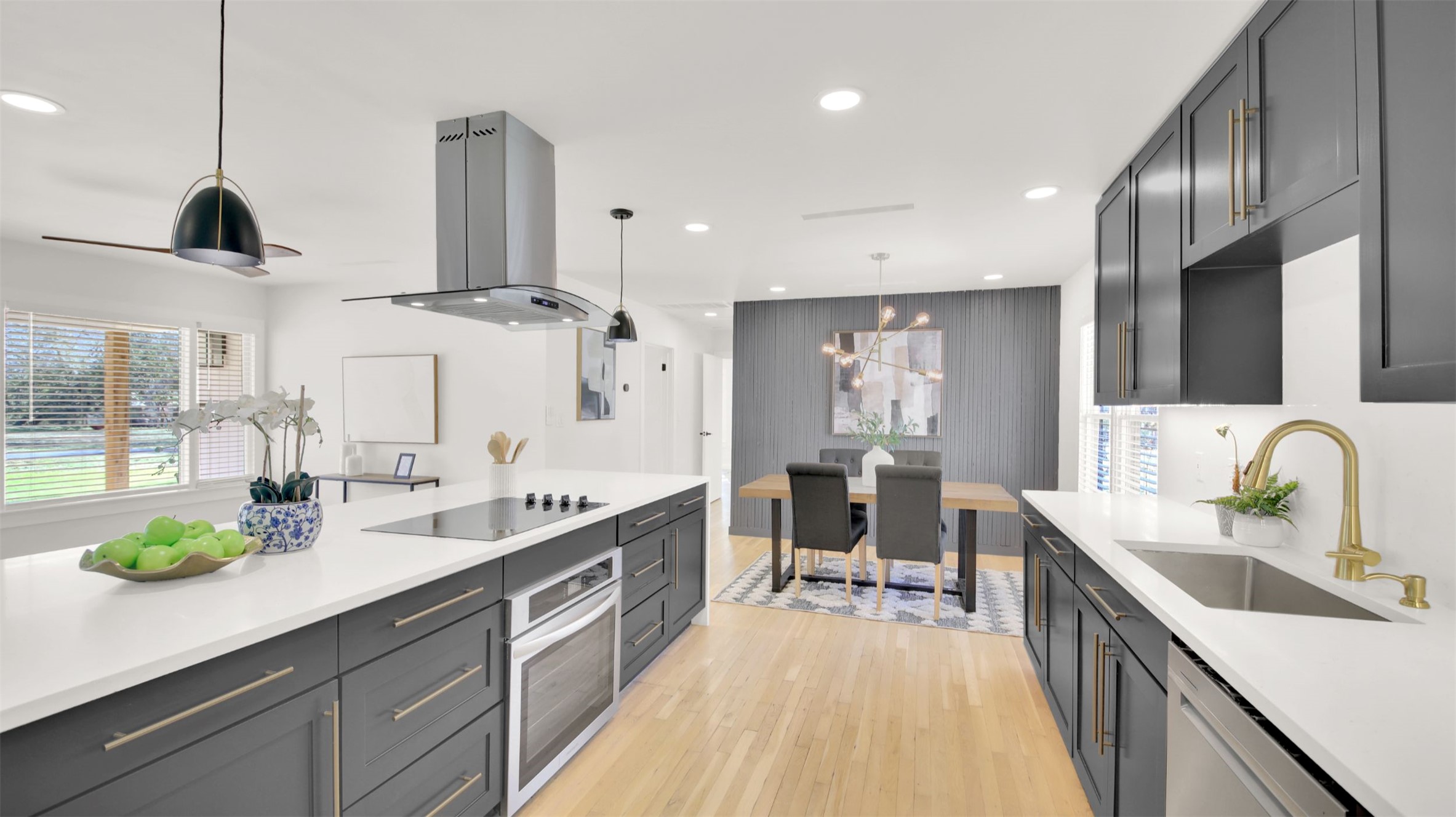 8904 Chisholm Lane Austin, TX 78748 - Photo 6 of 36 Kitchen featuring pendant lighting, stainless steel appliances, island exhaust hood, a chandelier, and light stone countertops