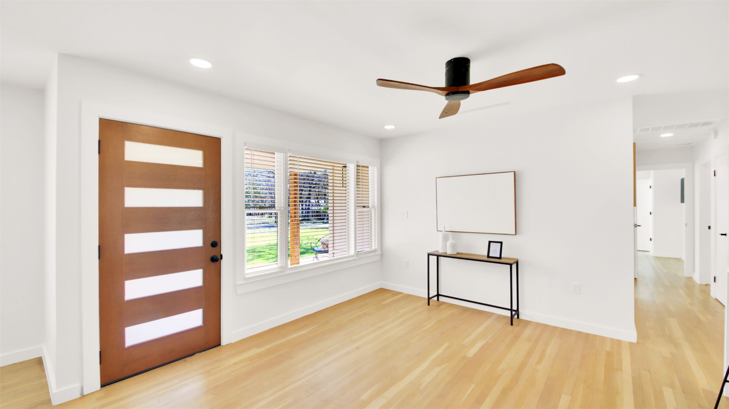 8904 Chisholm Lane Austin, TX 78748 - Photo 9 of 40 Entrance foyer with light wood finished floors, a ceiling fan, and recessed lighting