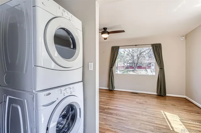 a view of a hallway with washer and dryer