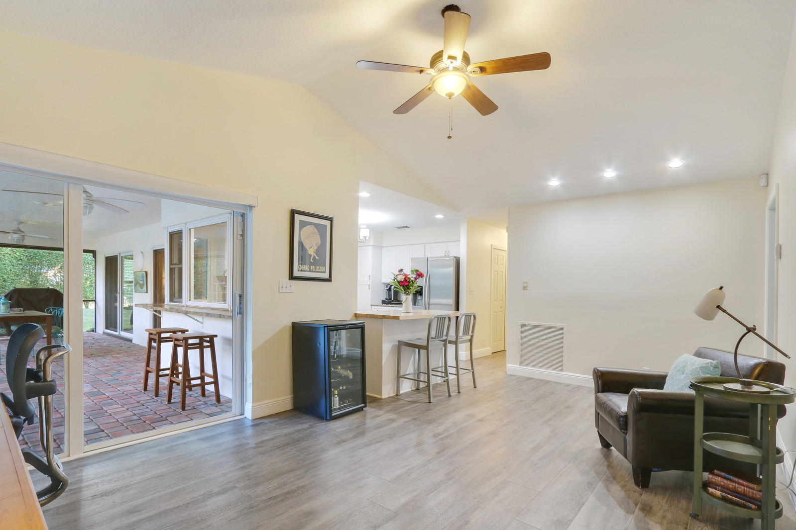2410 Northwest 32nd Street Boca Raton, FL 33431 - Photo 6 of 29 Family Room Opening to Covered Patio