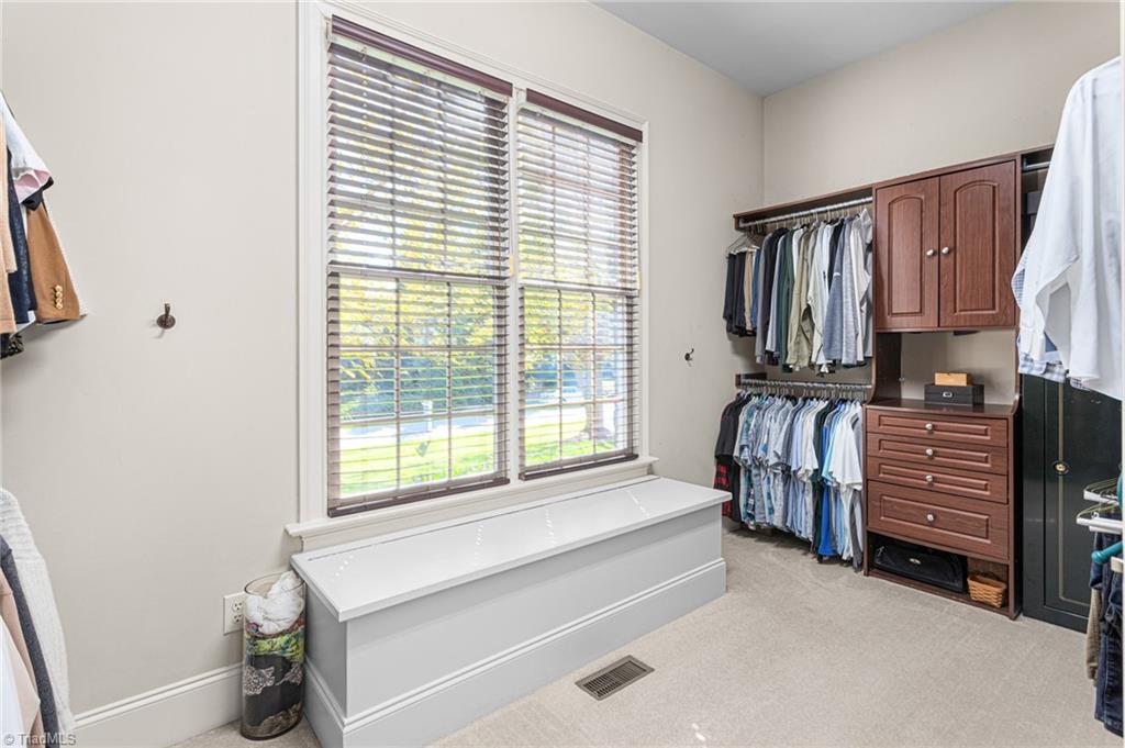 8404 Linville Oaks Drive Oak Ridge, NC 27310 - Photo 24 of 47 Primary closet