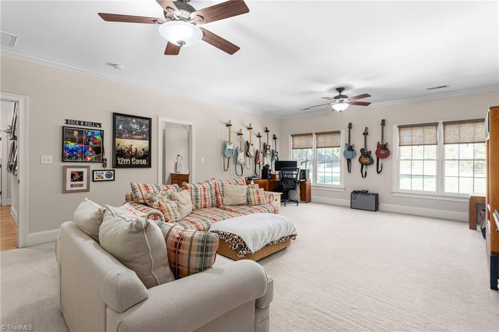 8404 Linville Oaks Drive Oak Ridge, NC 27310 - Photo 33 of 47 Expansive bonus room