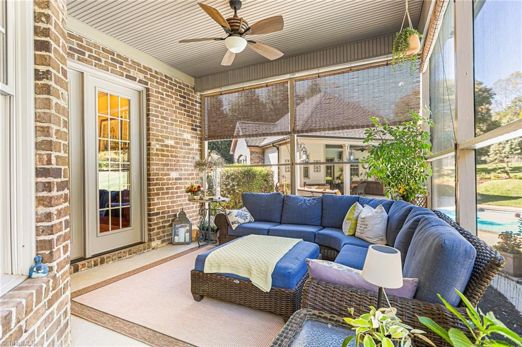 8404 Linville Oaks Drive Oak Ridge, NC 27310 - Photo 37 of 47 Beautiful screened-in porch off keeping room