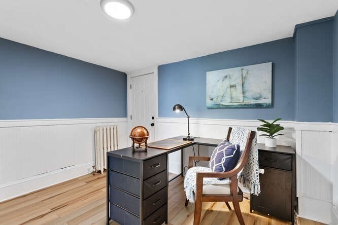 44 Cherry Street, Unit 2 Swampscott, MA 01907 - Photo 17 of 36 a room with a table and chairs