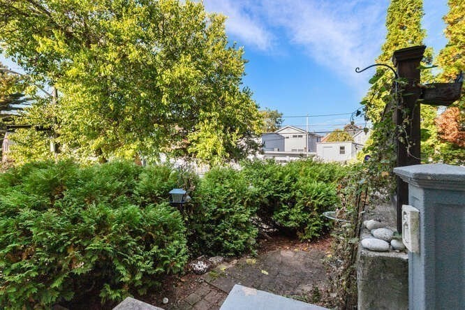 44 Cherry Street, Unit 2 Swampscott, MA 01907 - Photo 28 of 36 a view of a garden with plants