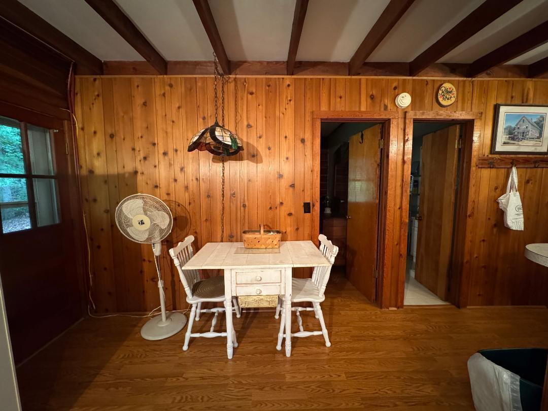 388 Salt House Branch Road Henry, VA 24102 - Photo 25 of 42 a view of a dining room with furniture window and wooden floor