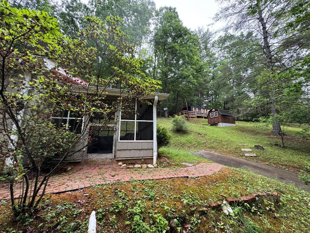 388 Salt House Branch Road Henry, VA 24102 - Photo 6 of 42 a view of a house with backyard and sitting area