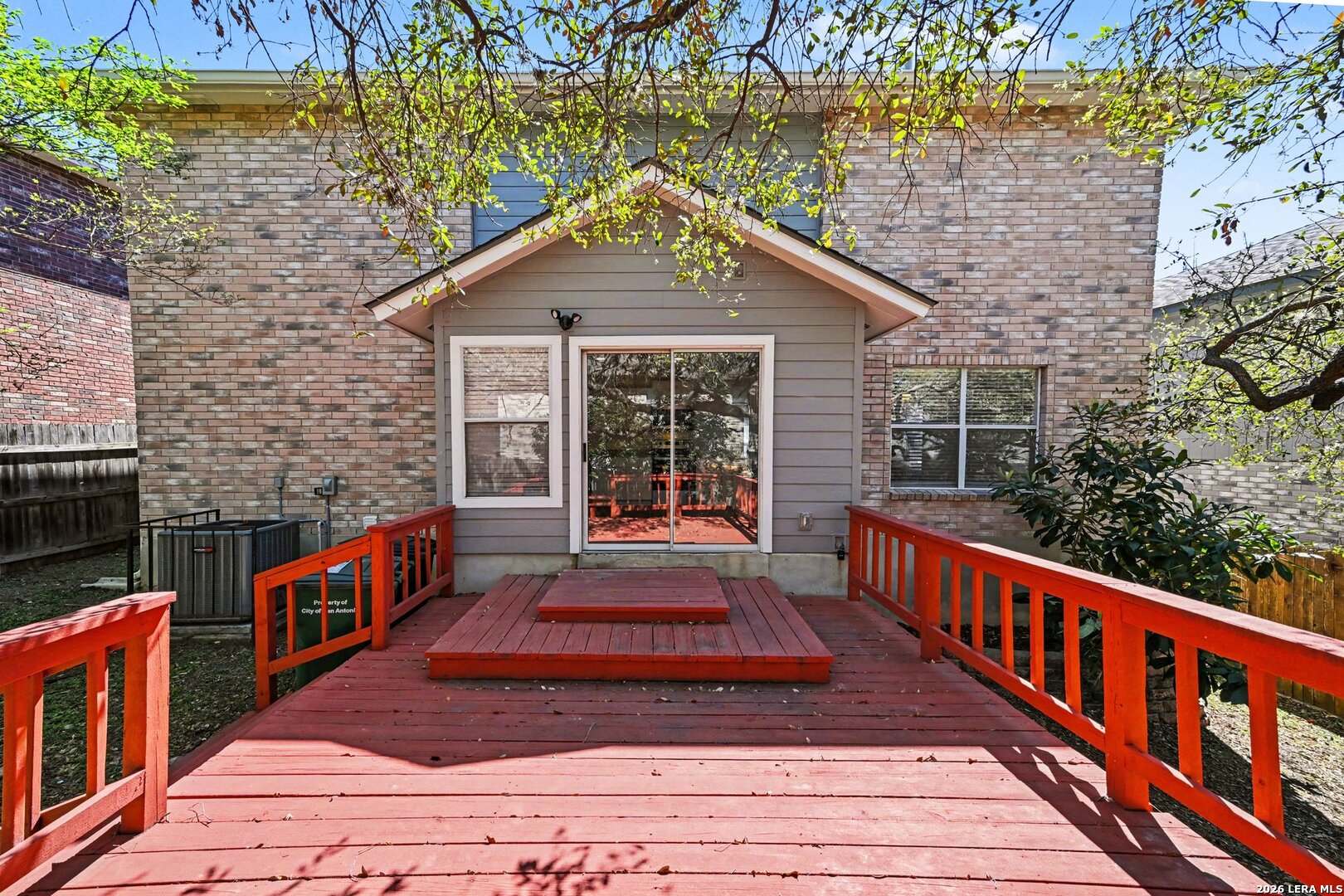 2407 Canyon Rim San Antonio, TX 78232 - Photo 27 of 30 a front view of a house with balcony