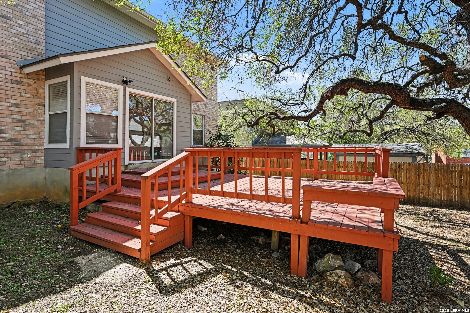 2407 Canyon Rim San Antonio, TX 78232 - Photo 29 of 30 a view of a wooden bench sitting in backyard