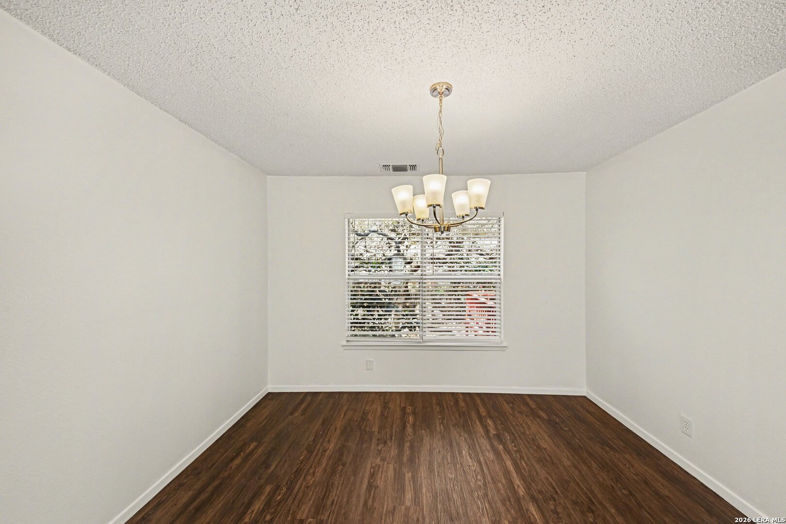 2407 Canyon Rim San Antonio, TX 78232 - Photo 9 of 30 a view of empty room with wooden floor
