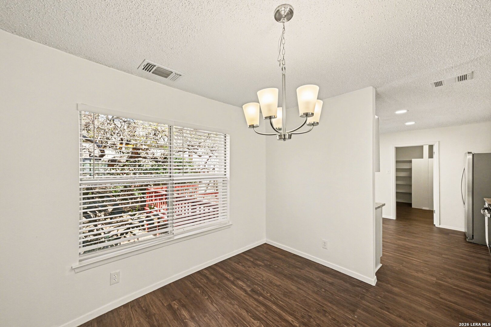 2407 Canyon Rim San Antonio, TX 78232 - Photo 10 of 30 a view of a room with wooden floor