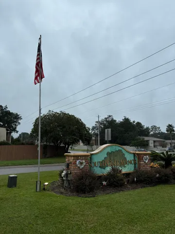 a childrens park with lots of swings and slides