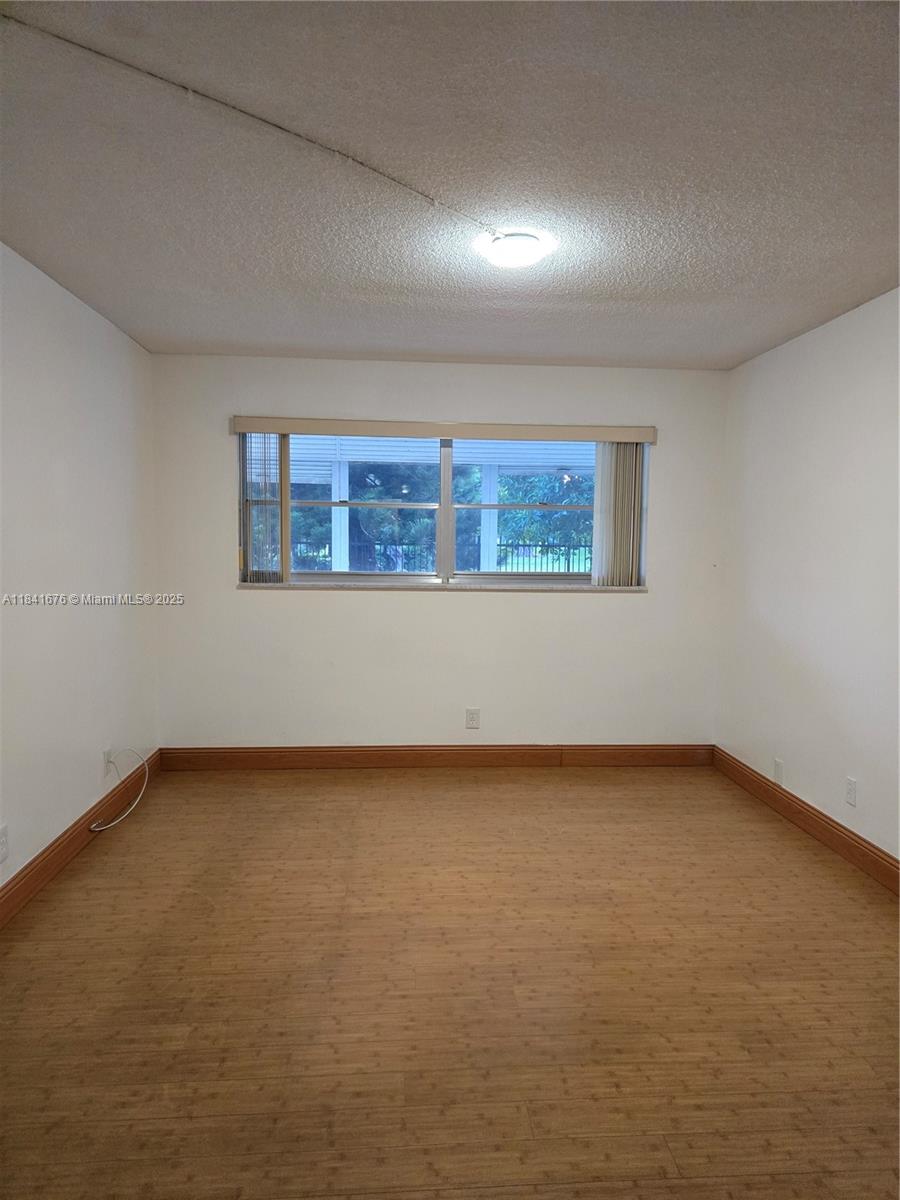 950 Hillcrest Drive, Unit 106 Hollywood, FL 33021 - Photo 13 of 30 a view of a room with window