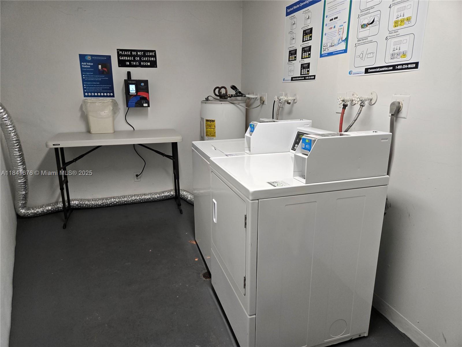 950 Hillcrest Drive, Unit 106 Hollywood, FL 33021 - Photo 26 of 30 a utility room with dryer and washer
