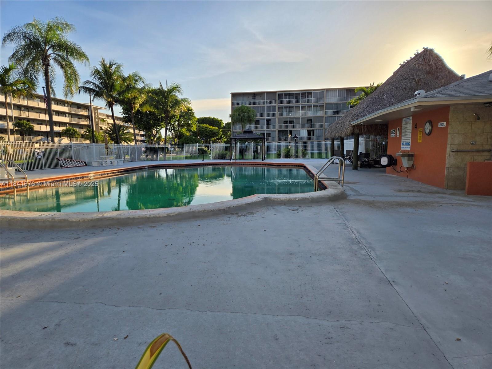 950 Hillcrest Drive, Unit 106 Hollywood, FL 33021 - Photo 27 of 30 a view of swimming pool with a patio