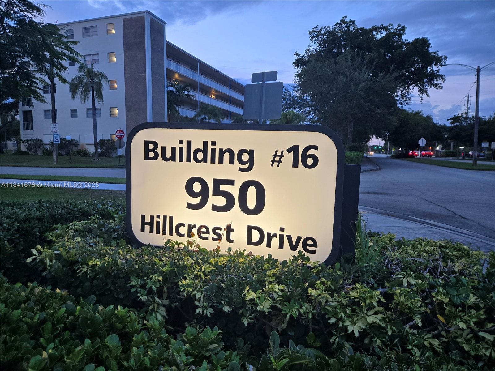 950 Hillcrest Drive, Unit 106 Hollywood, FL 33021 - Photo 5 of 30 a sign broad on the side of a building