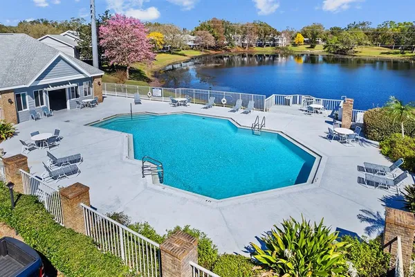 an aerial view of a house with outdoor space