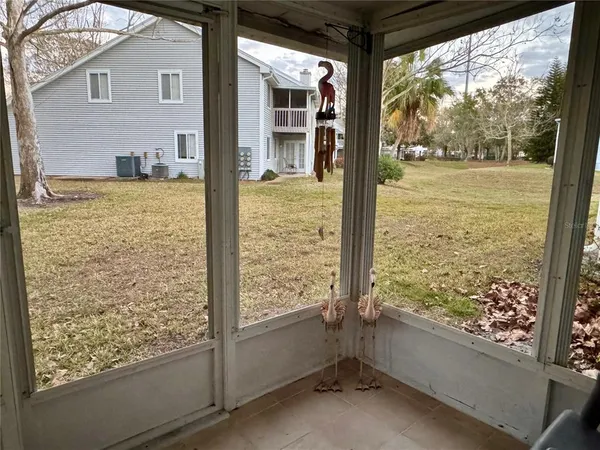 a view of a room with wooden floor and walls