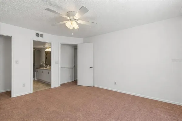 a view of a livingroom with a ceiling fan