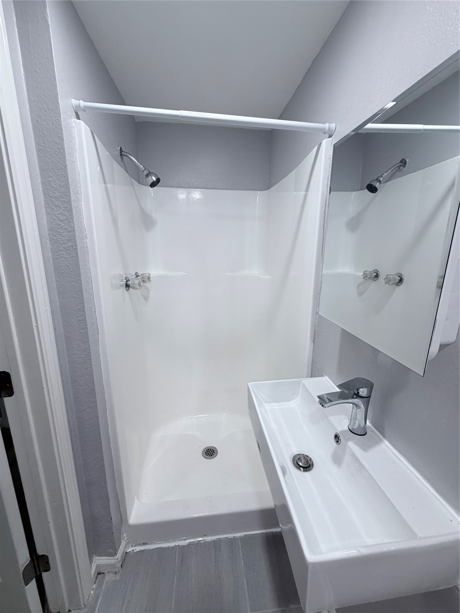1903 Little Street La Marque, TX 77568 - Photo 15 of 18 a bathroom with a sink and shower