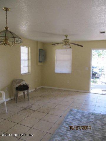 3902 Brick Road Jacksonville, FL 32209 - Photo 3 of 6 a view of a livingroom with a window