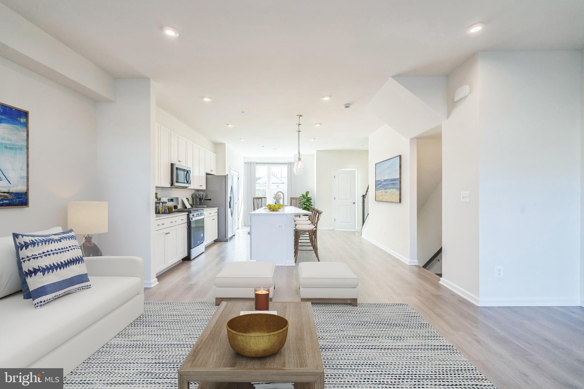 20 Riverside Drive Cambridge, MD 21613 - Photo 7 of 17 a living room with furniture and a wooden floor