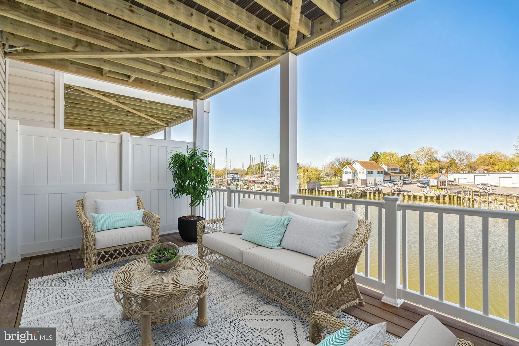 20 Riverside Drive Cambridge, MD 21613 - Photo 9 of 17 a view of balcony with furniture