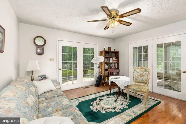 a bed room with a bed and a window