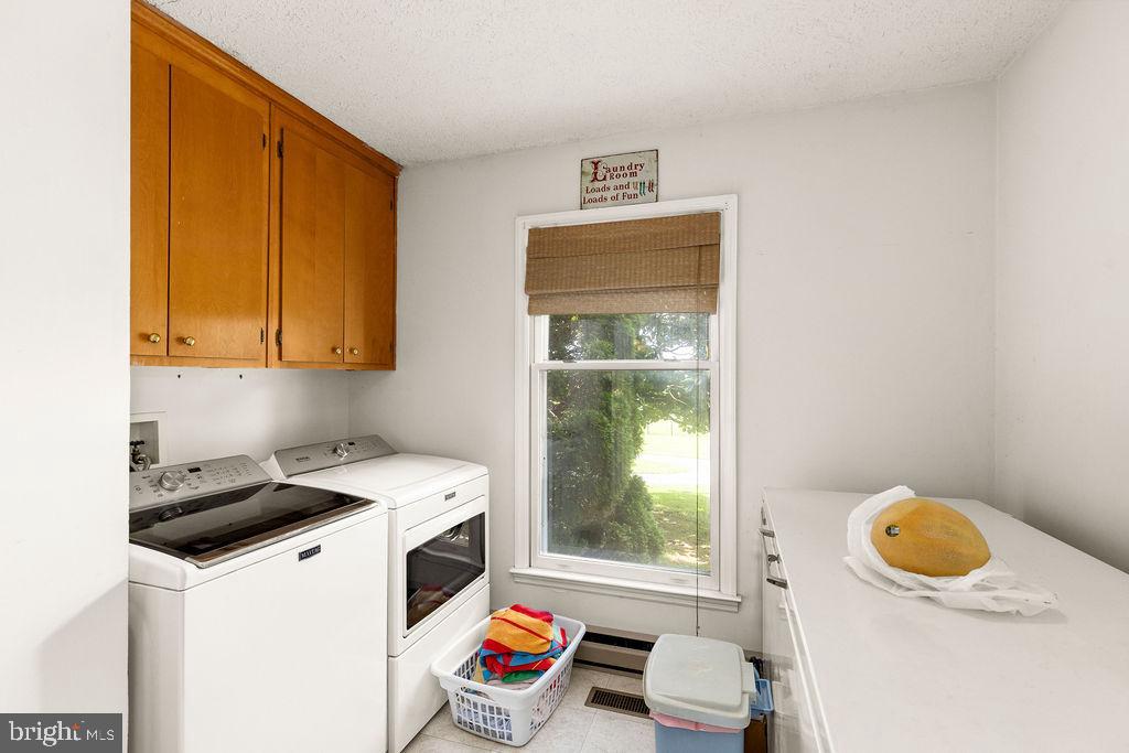 1115 Chapel Road Middletown, VA 22645 - Photo 29 of 54 a view of a kitchen with a sink and a refrigerator