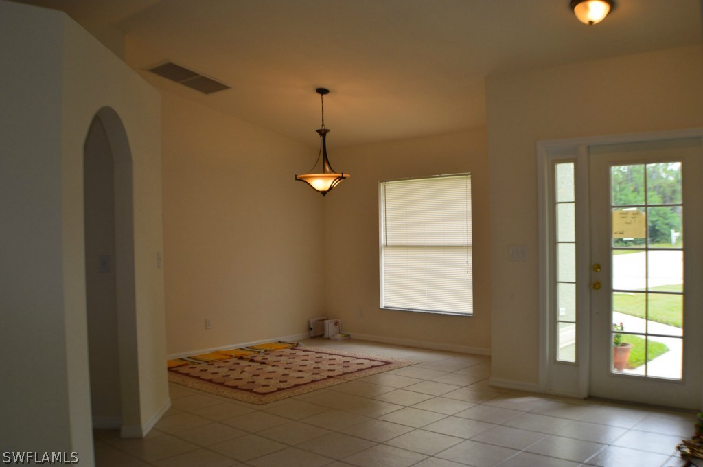 134 Ridgemont Drive Lehigh Acres, FL 33972 - Photo 4 of 14 a view of livingroom with window