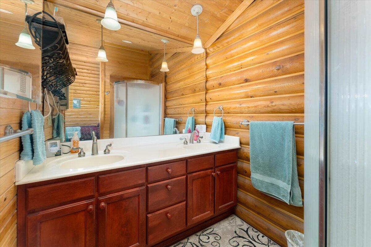 4208 Balls Ferry Road Cottonwood, CA 96022 - Photo 15 of 53 a bathroom with a sink and a mirror