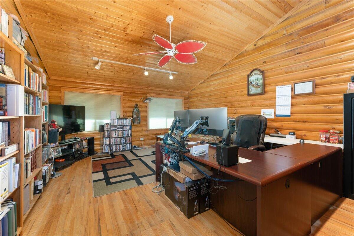 4208 Balls Ferry Road Cottonwood, CA 96022 - Photo 21 of 53 a view of a workspace with furniture and a window