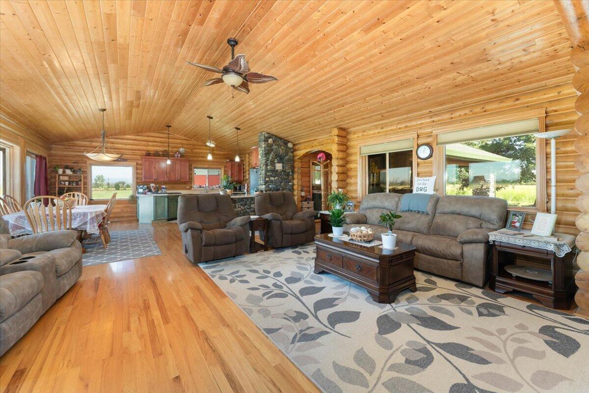 4208 Balls Ferry Road Cottonwood, CA 96022 - Photo 3 of 53 a living room with furniture and a chandelier