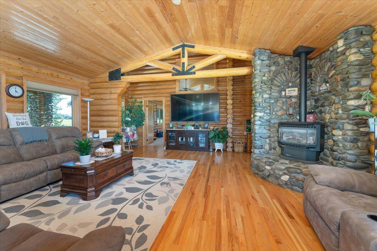 4208 Balls Ferry Road Cottonwood, CA 96022 - Photo 4 of 53 a living room with furniture and a fireplace