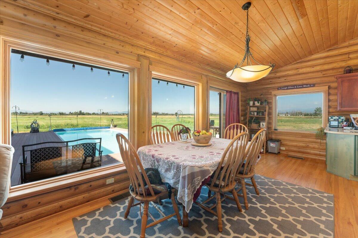4208 Balls Ferry Road Cottonwood, CA 96022 - Photo 10 of 53 a view of a dining room with furniture