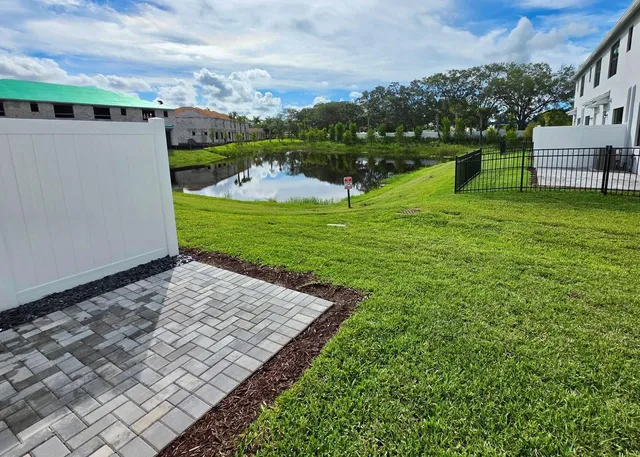 a picture of a bench in front of a wall