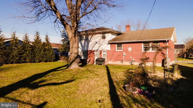a view of a house with swimming pool